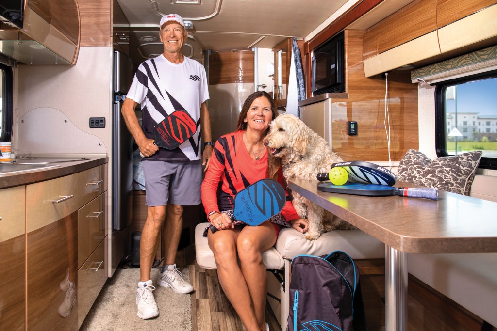 InPickleball | Pickleball and the pooch | Bob and Kelle travel by RV with their Labradoodle, Charley, who watches from the sideline while they play